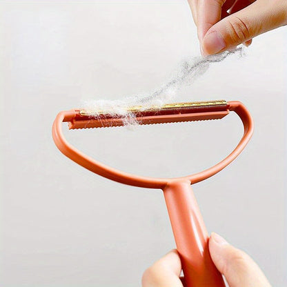 Brosse ramasse poils